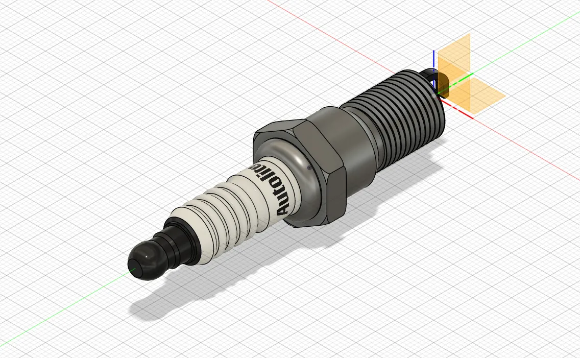 Spark plug modelled in Fusion 360 — threads, hex, and insulator ribs