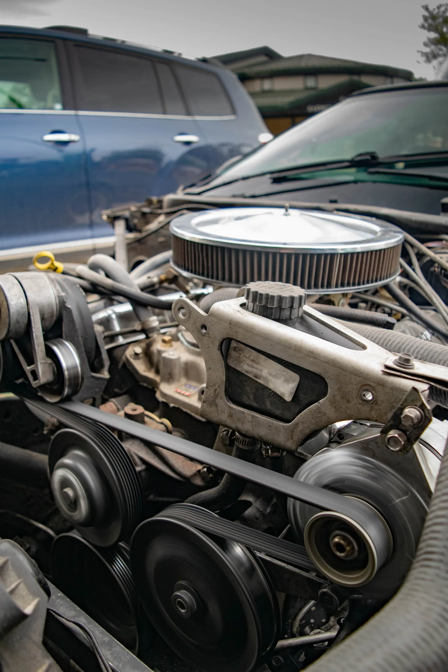 The engine bay during the power steering replacement