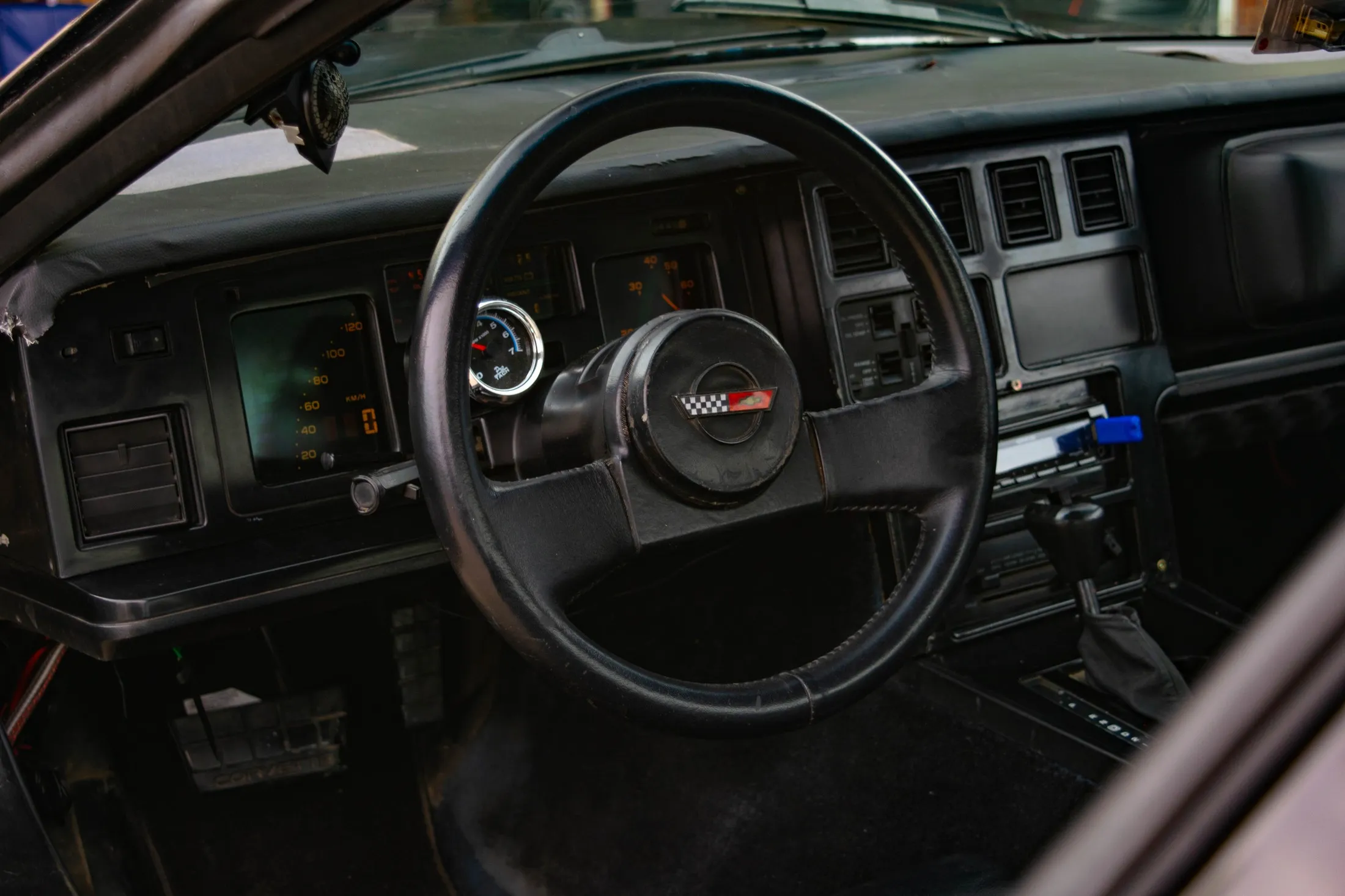 The refinished interior — with the added tachometer and new head unit visible