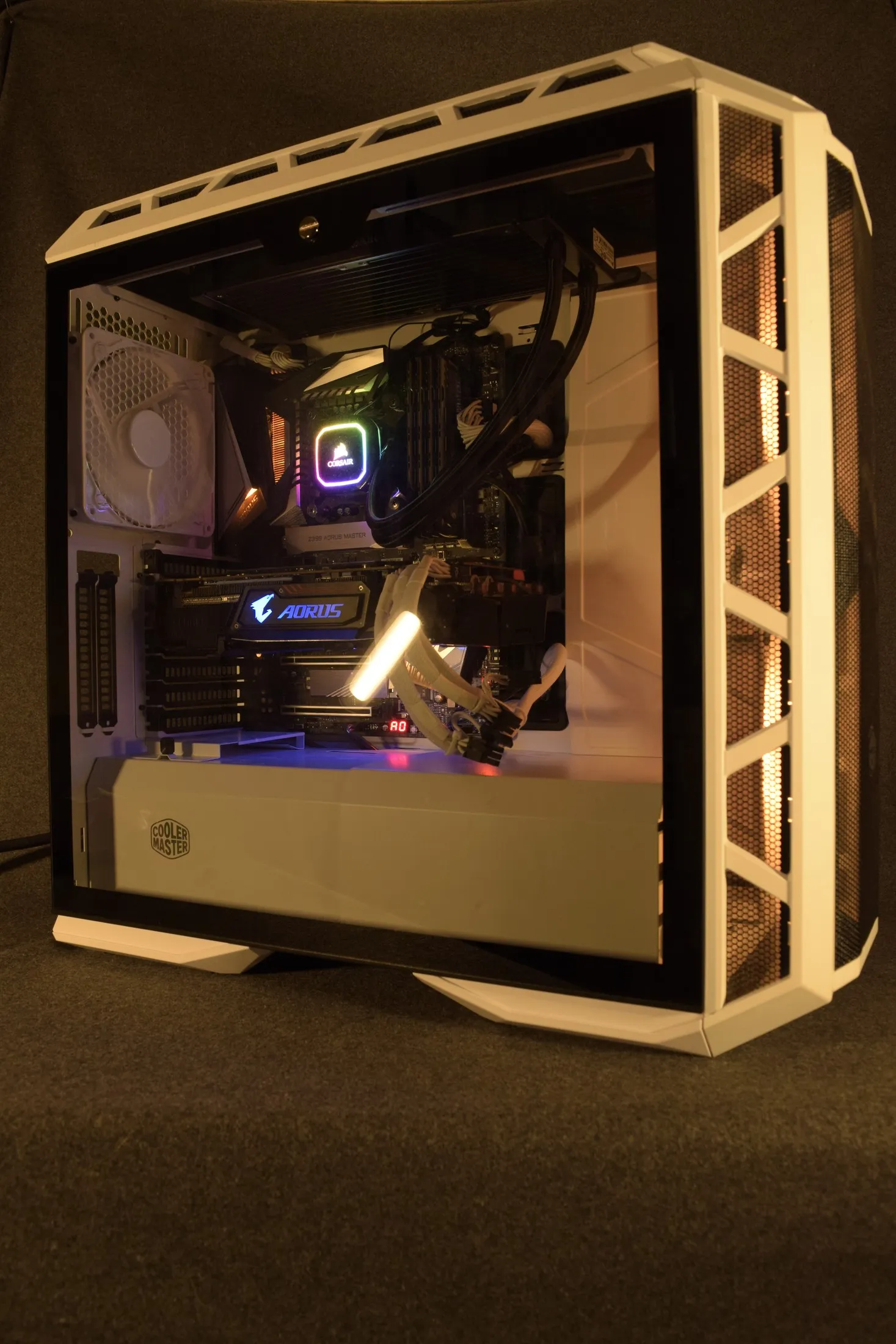 Cooler Master build — white sleeved cables and a Corsair AIO